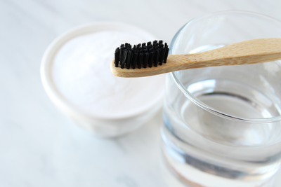 Baking Soda and Coconut Oil Toothpaste with Toothbrush